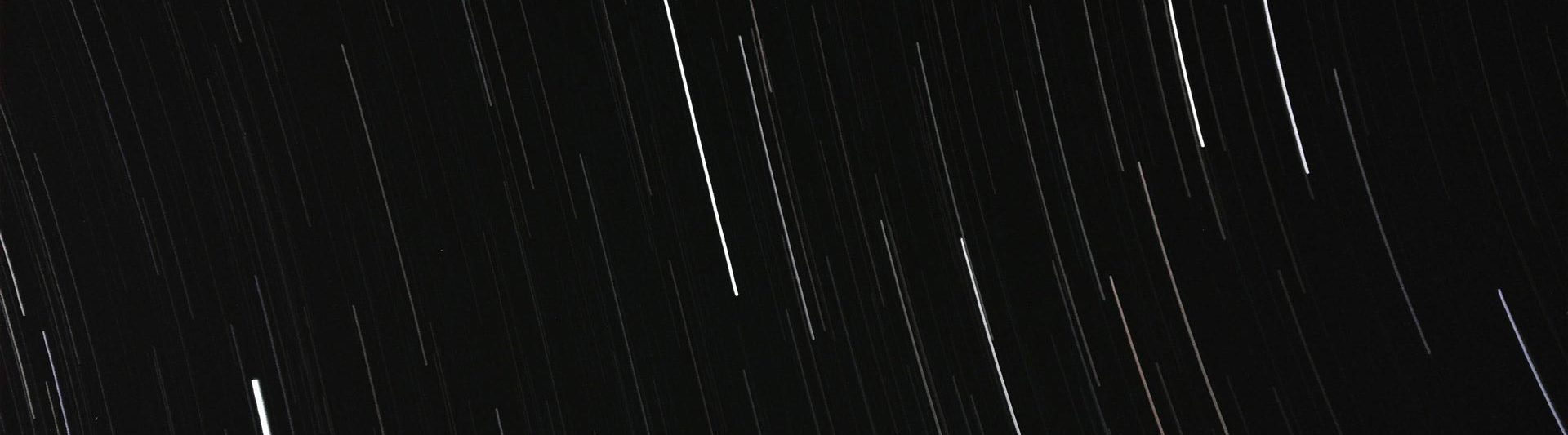 white-streaks-on-black-background